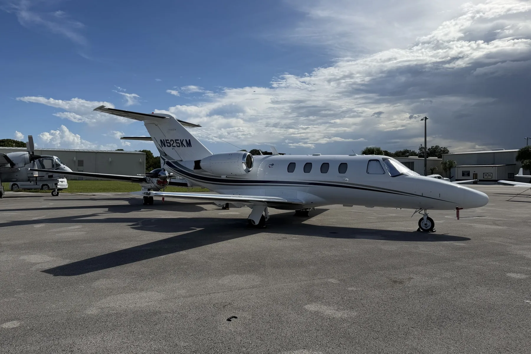 Side view of Citation CJ1 N525KM on the ramp