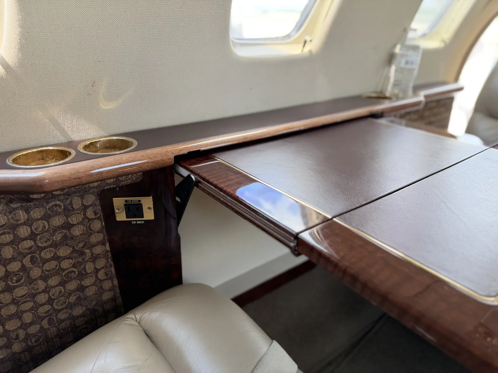 Fold-out wood table detail in the CJ1 cabin